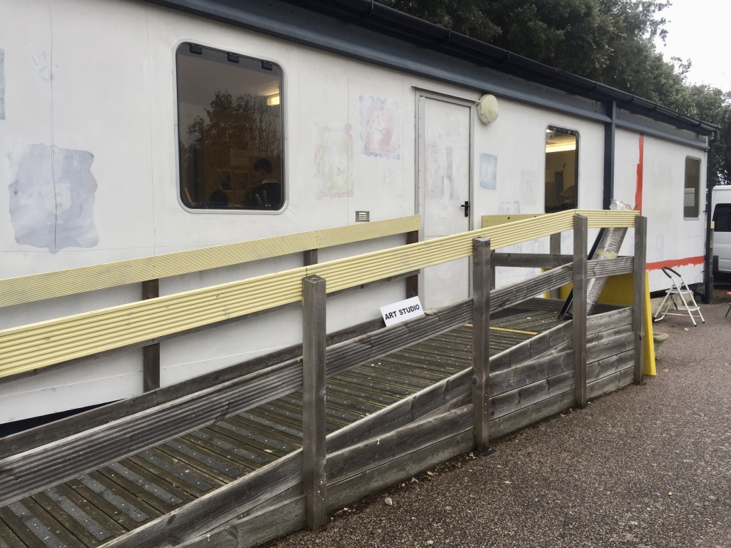 Palm Bay arts studio cabin - painted white